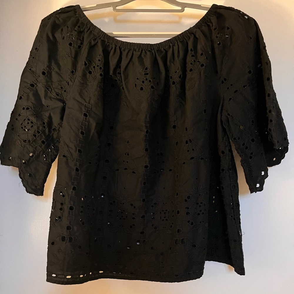 Black eyelet top.